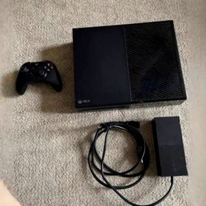 I am selling a black Xbox One  with all cords and a controller.